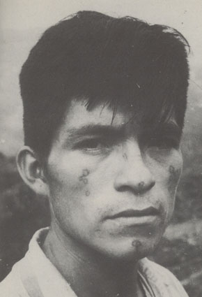 Jivaro with mysterious tattoos, Ecuador, 1976